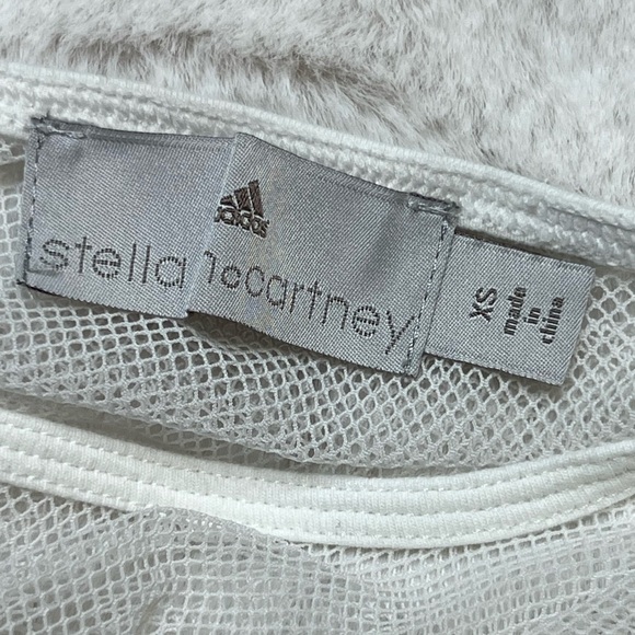 White adidas work out active shirt with mesh on the top and bottom. - Picture 8 of 8